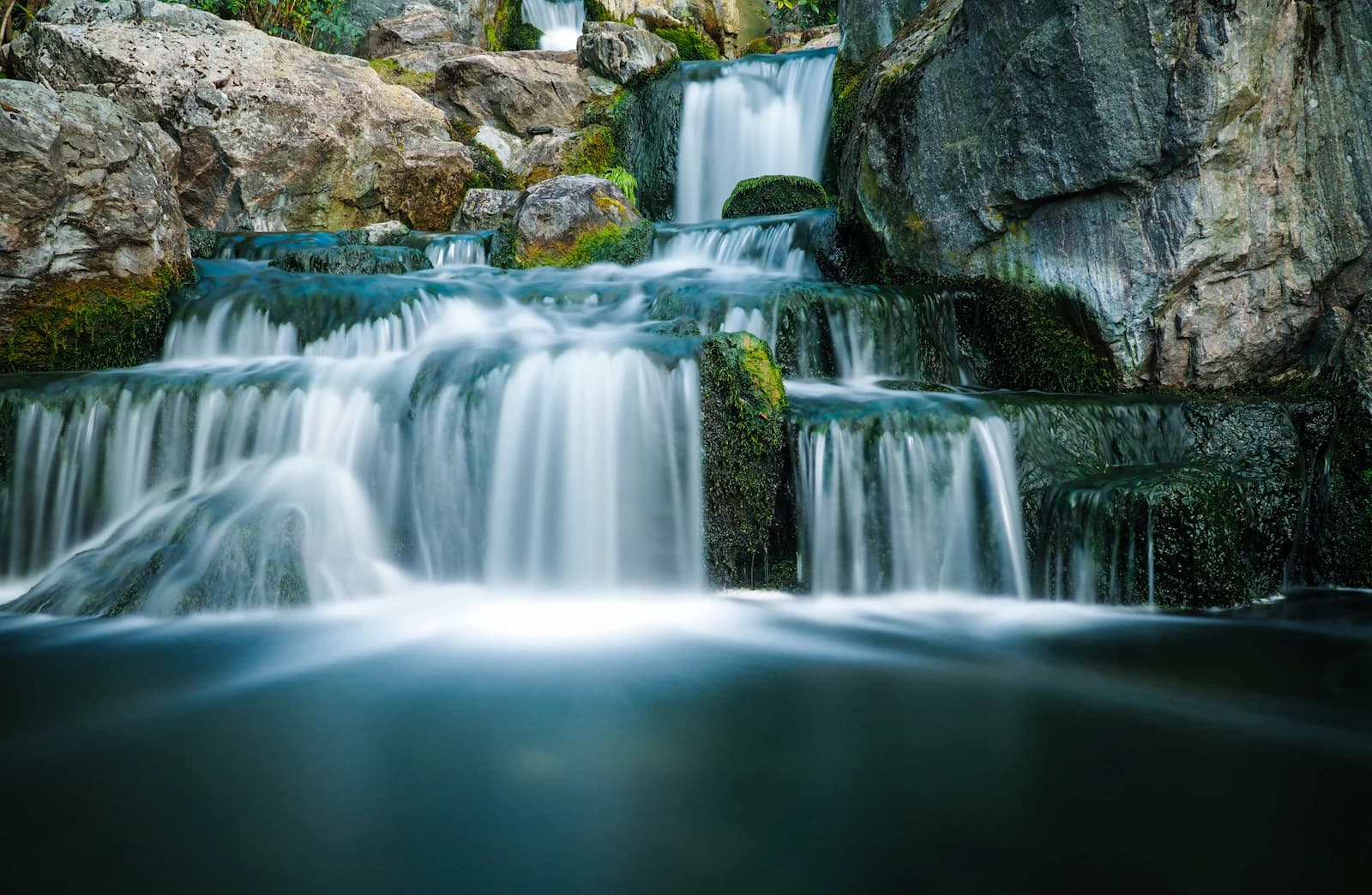 Long-exposure waterfall with silky smooth water flowing over rocks