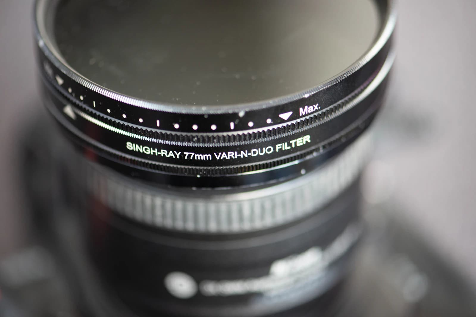 Close-up of a variable ND filter ring with its scale mounted on a camera lens