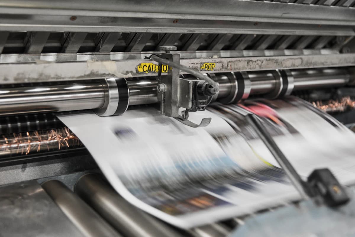 A large-format printer producing a photo print